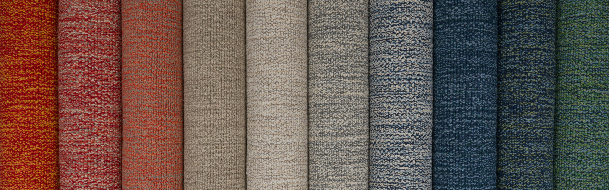 Rolls of Heathered Eco Cotton rugs, red through blue
